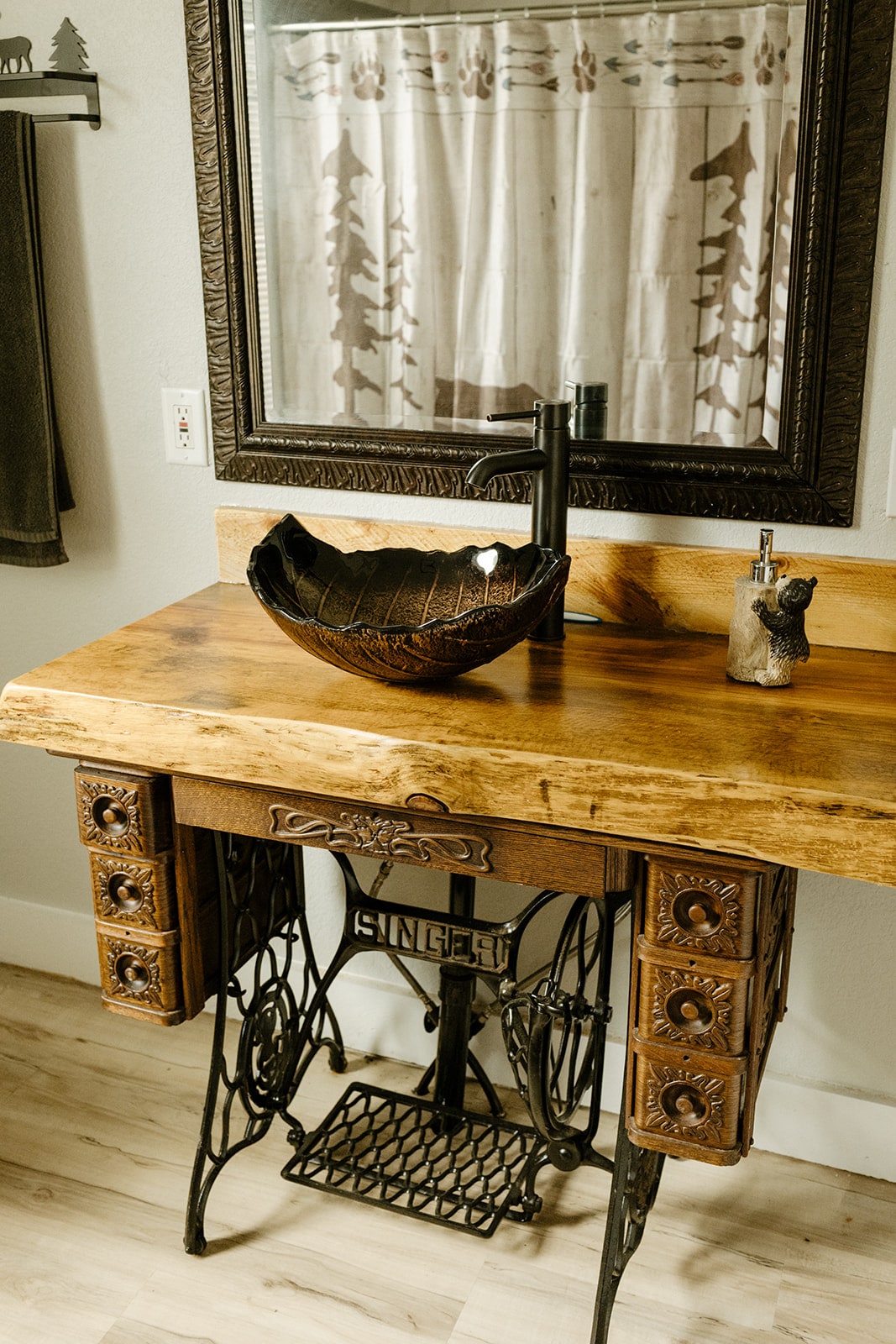 Rustic bathroom vanity with wood counter and vessel sink