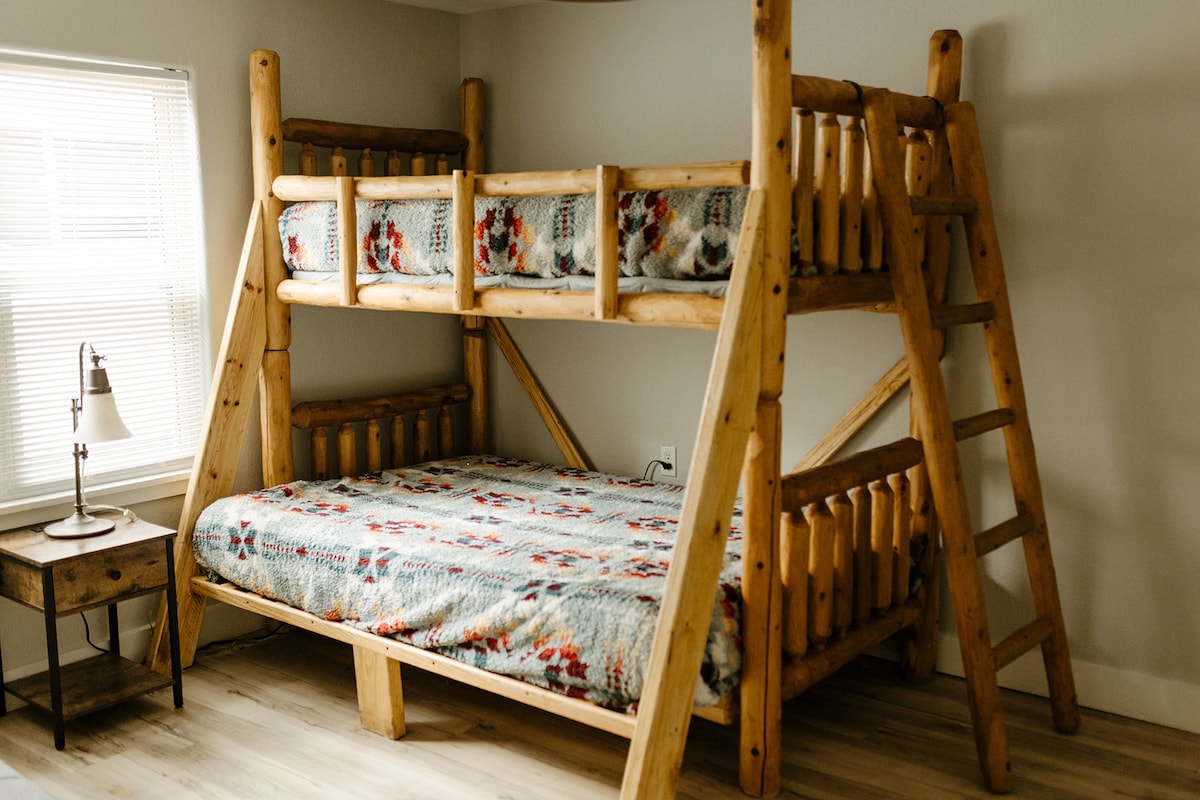Cabin bedroom with soft bedding
