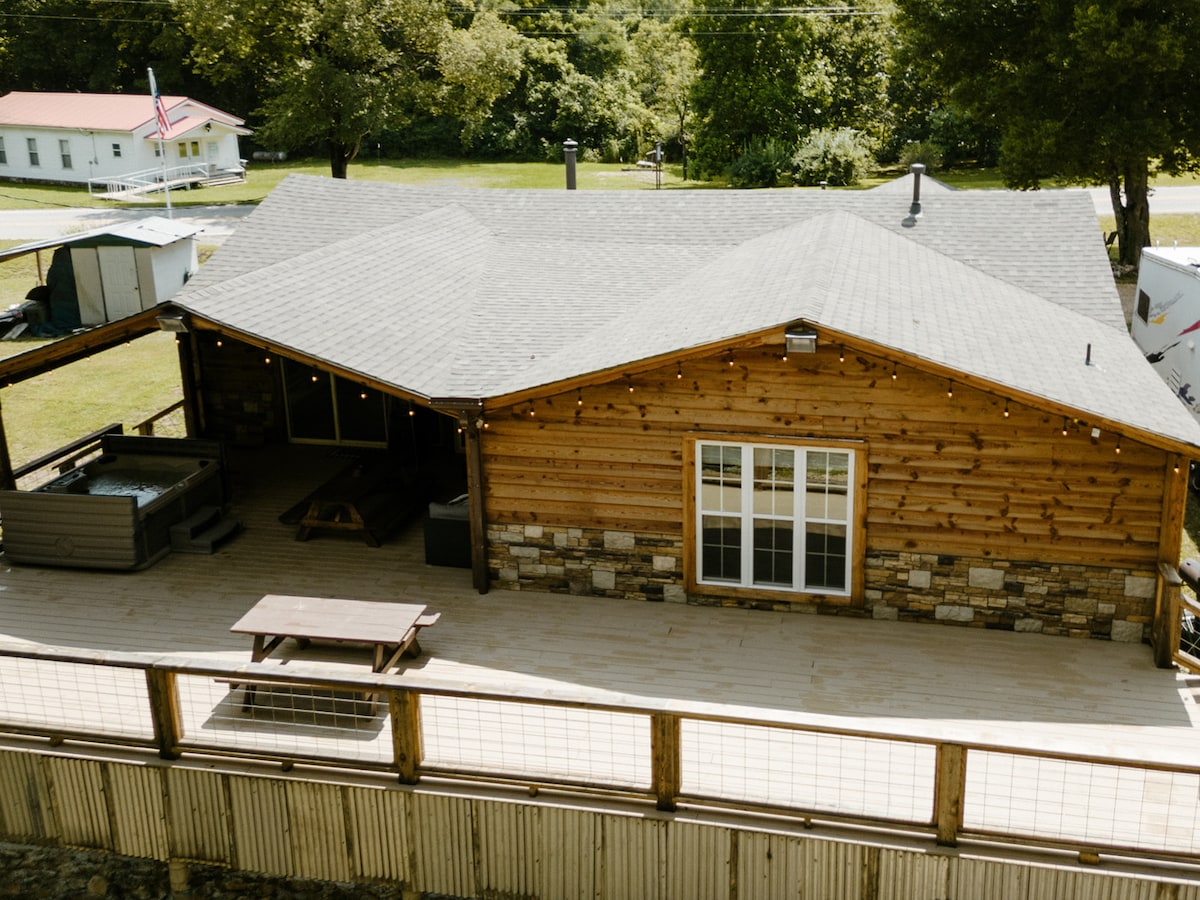 Outdoor hot tub at Running Water Cabin