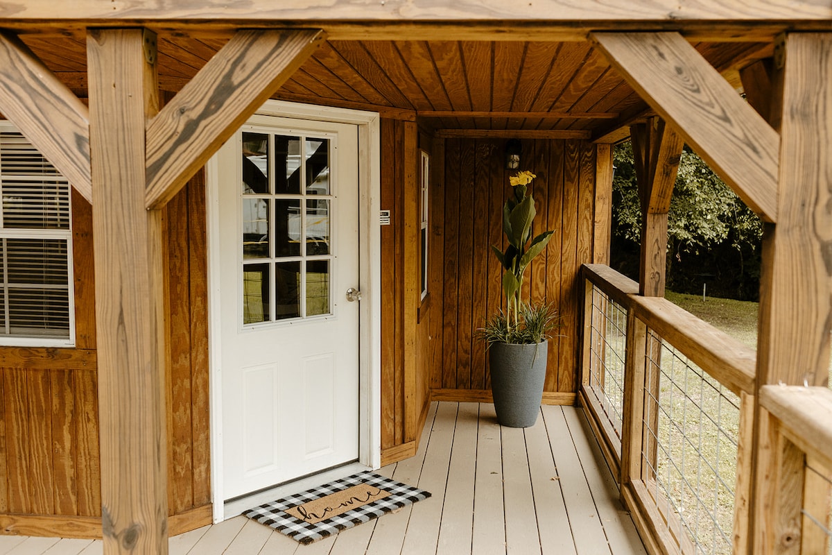 Tiny cabin sleeping loft and interior view