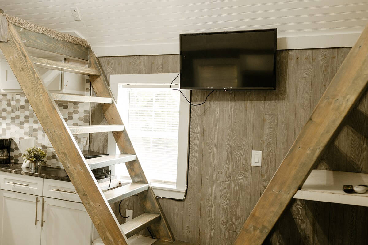 Tiny cabin bedroom and loft detail